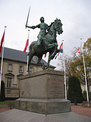 Statue of Joan of Arc on horseback with sword originally in front of the Cathedral of Reims