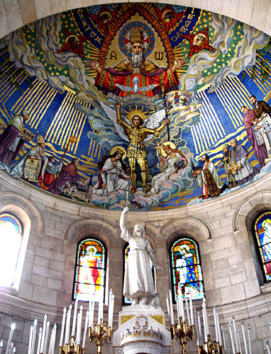 Joan of Arc statue inside the Basilica of Joan of Arc - Photo by Chris Snidow of PilgrimWitnesses.com