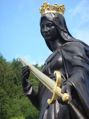 Saint statue outside Basilica of Joan of Arc near Domremy -	Photo by Chris Snidow of PilgrimWitnesses.com