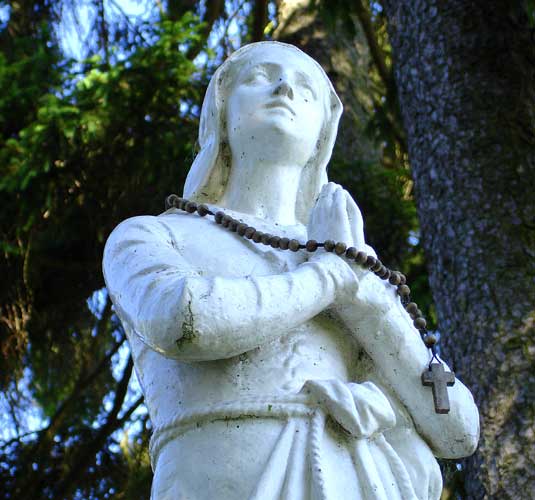 Closeup of Joan of Arc statue outside the Basilica of Joan of Arc