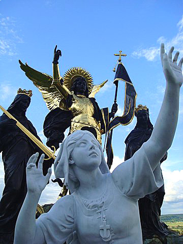 Saint statue outside Basilica of Joan of Arc near Domremy -	Photo by Chris Snidow of PilgrimWitnesses.com