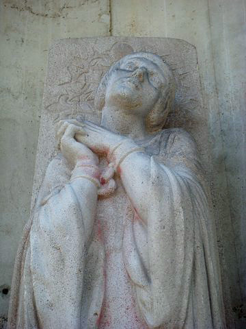 Joan of Arc praying at the stake statue in Rouen, France