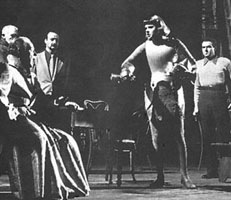 Joan pressures the Dauphin to go to Reims